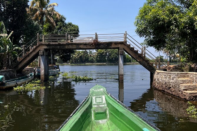 6hrs Alleppey Houseboat Tour-Serene Canals, Local Life & Food. - SNDP Thod: temples, churches, homes, and a government health centre