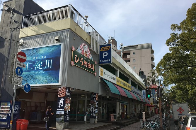 Experience the energy of Kochi: Sunday Market Tour includes Kochi Castle - Obiyamachi Old Town: shopping street views, minus the weather stress