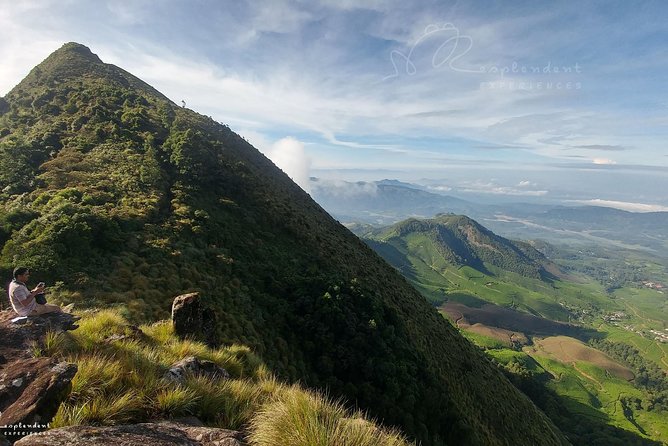 Trekking in Munnar - Ridge grasslands and rocky mountain slope views